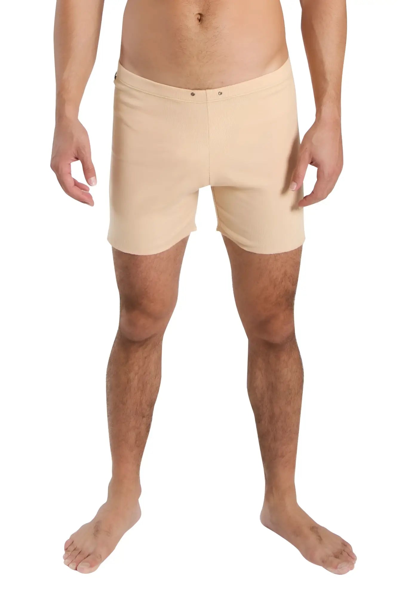Beige fusion yoga short in form-fitting smooth fabric with subtle front seam detail ideal for swim or activewear