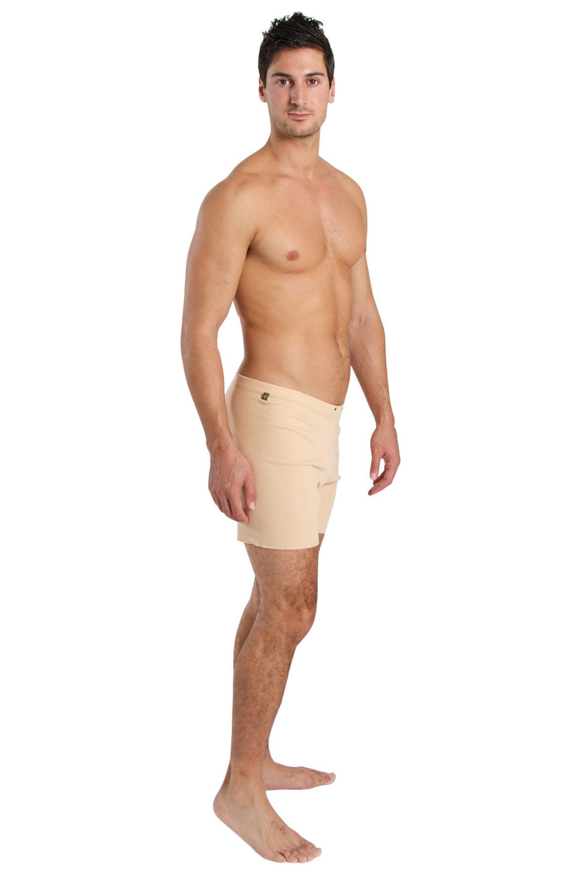 Beige fusion yoga shorts with subtle side seam and button closure at waistband designed for athletic wear