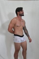 White gay karmasutra trunk boxer briefs with black outlined figure illustrations and solid black waistband
