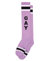 Lavender knee high socks with bold black gay lettering and contrasting white and black striped accents