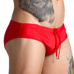 Gigo Brazilian red swim brief with bright red fabric and drawstring waistband featuring metallic aglets