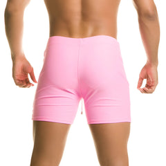 Pink athletic shorts with smooth form-fitting fabric and small back zipper from gigo classic pink beachwear collection