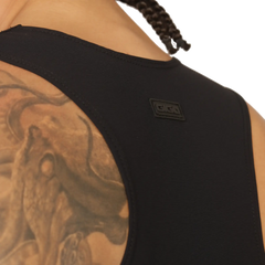 Gigo Club black tank top made of textured fabric with a small rectangular logo patch on the shoulder