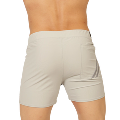 Beige gigo club gray short athletic shorts with sleek form-fitting design and subtle gray side stripes