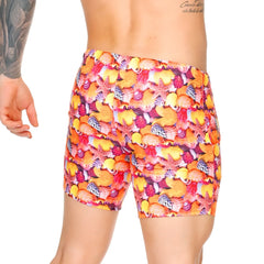 Vibrant orange and pink Gigo Corals swim trunks with seashell starfish and coral pattern for beachwear use