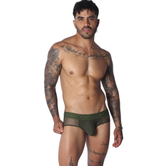 Olive green jockstrap featuring a mesh pouch and branded elastic waistband on a tattooed model.