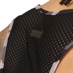 Gigo feeling black tank black mesh basketball jersey with gray and white trim and subtle logo patch on the chest