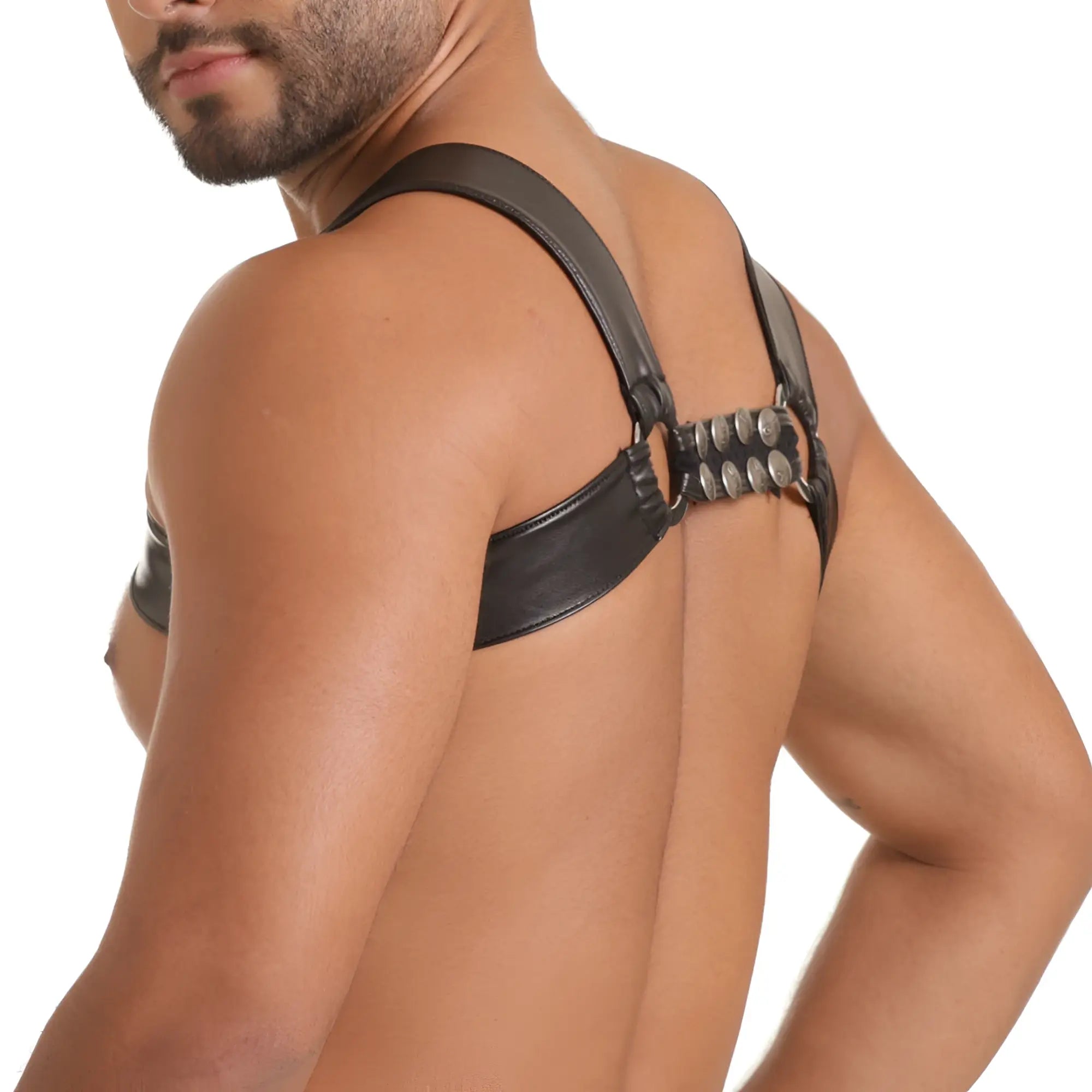 Black leather gigo fetish leather harness with silver toned metal studs shown from the back