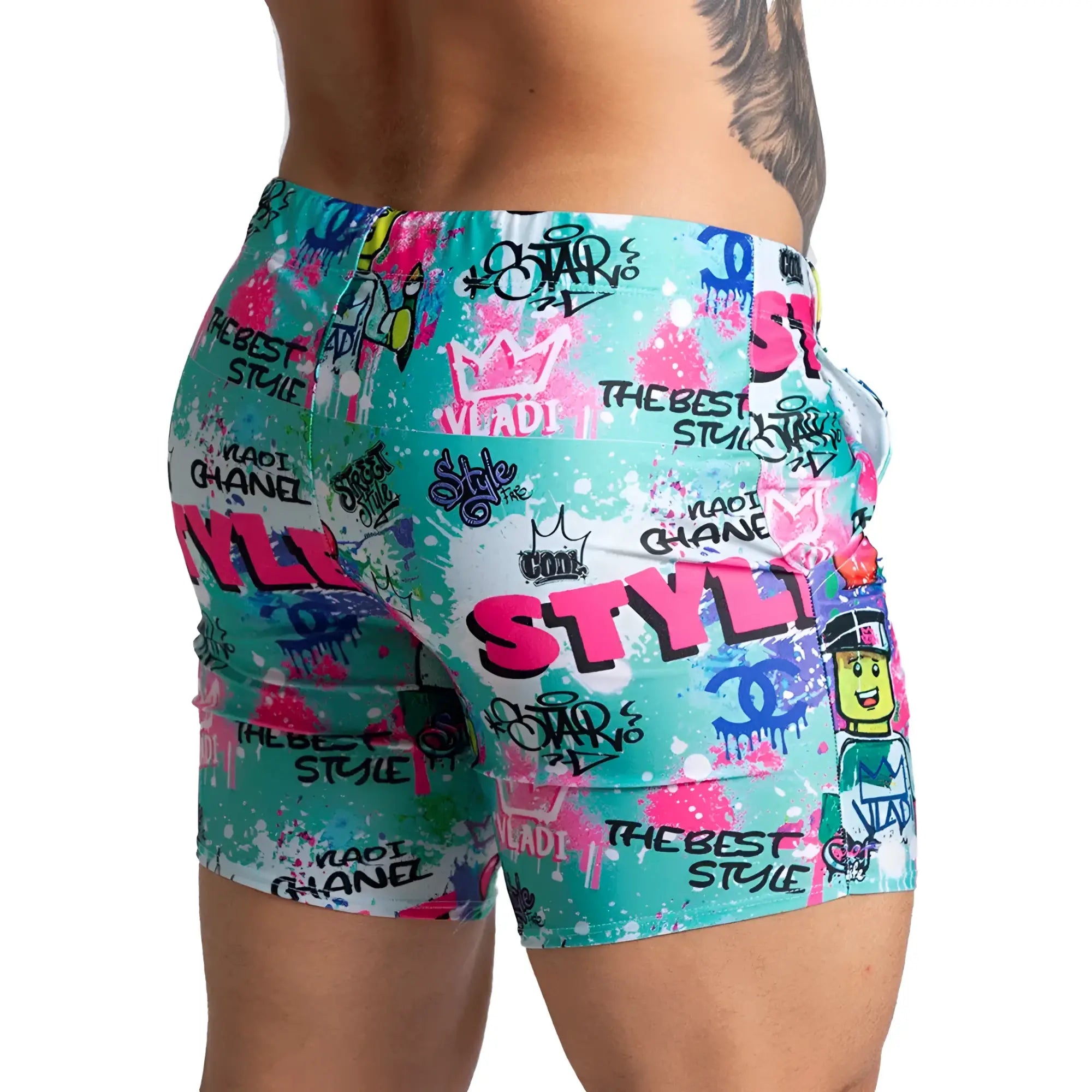 Gigo Figure Beachwear vibrant graffiti-patterned shorts in teal pink and white with bold style text and brand logos