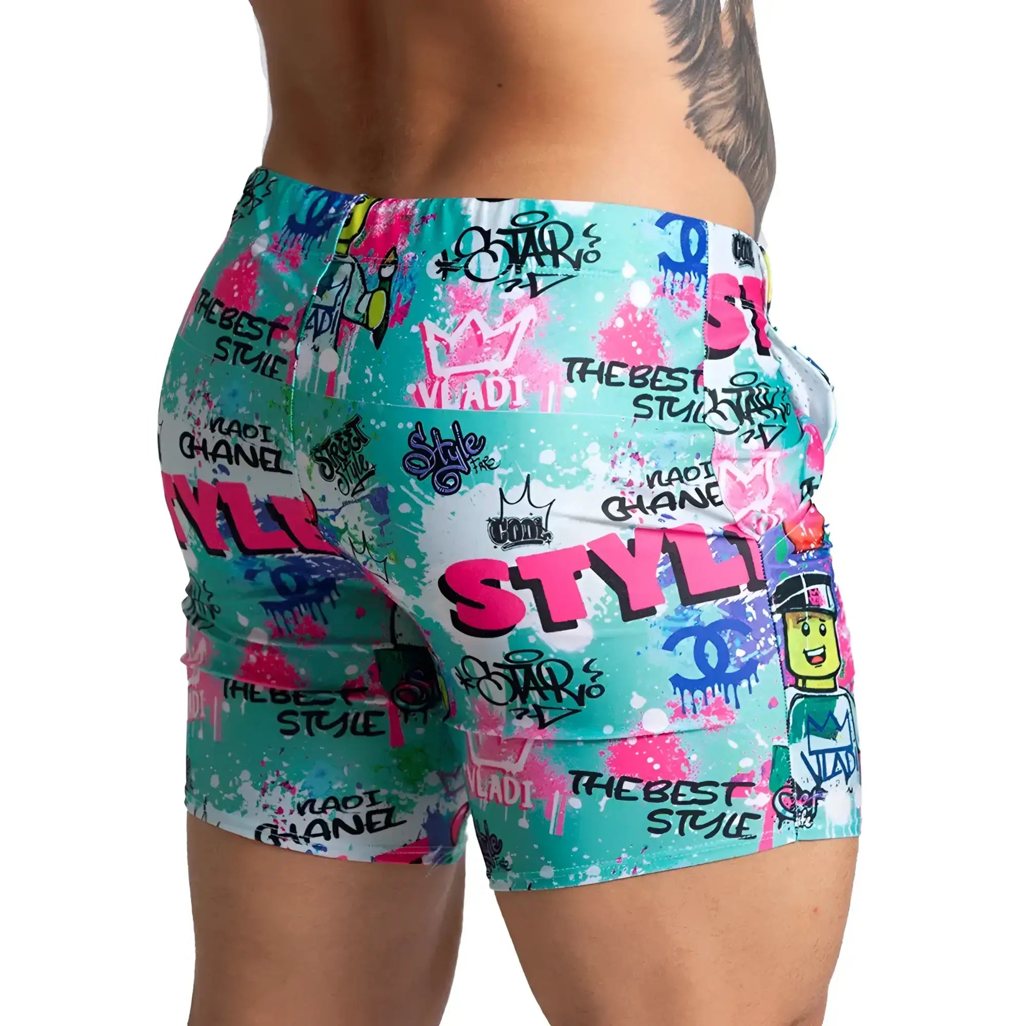 Gigo Figure Beachwear vibrant graffiti-patterned shorts in teal pink and white with bold style text and brand logos