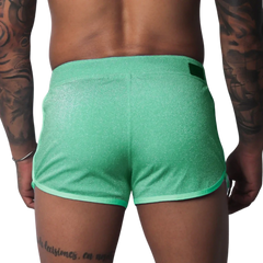 Flash green, shimmering athletic-style shorts with contrast trim and a rear waistband tab.