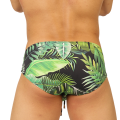 Black gigo forest swimbrief with vibrant green tropical leaf pattern made for swimming and beachwear