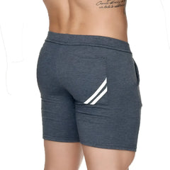 Back side of gigo forever long gray short showing dark gray heathered athletic shorts with white diagonal stripes on pocket