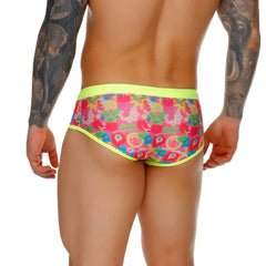 Gigo happy swim trunk brightly colored menâ€™s briefs with vibrant pink green yellow abstract pattern and neon lime trim