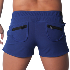 Royal blue short-length men’s athletic shorts with an elastic waistband and two back pockets featuring black zippers.