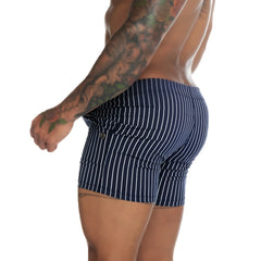 Navy blue and white vertically striped menâ€™s boxer briefs with button closure from gigo naval blue beachwear