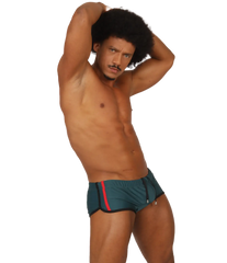 Teal swim trunks with red and black trim from Gigo Nice Green collection ideal for beach and pool use