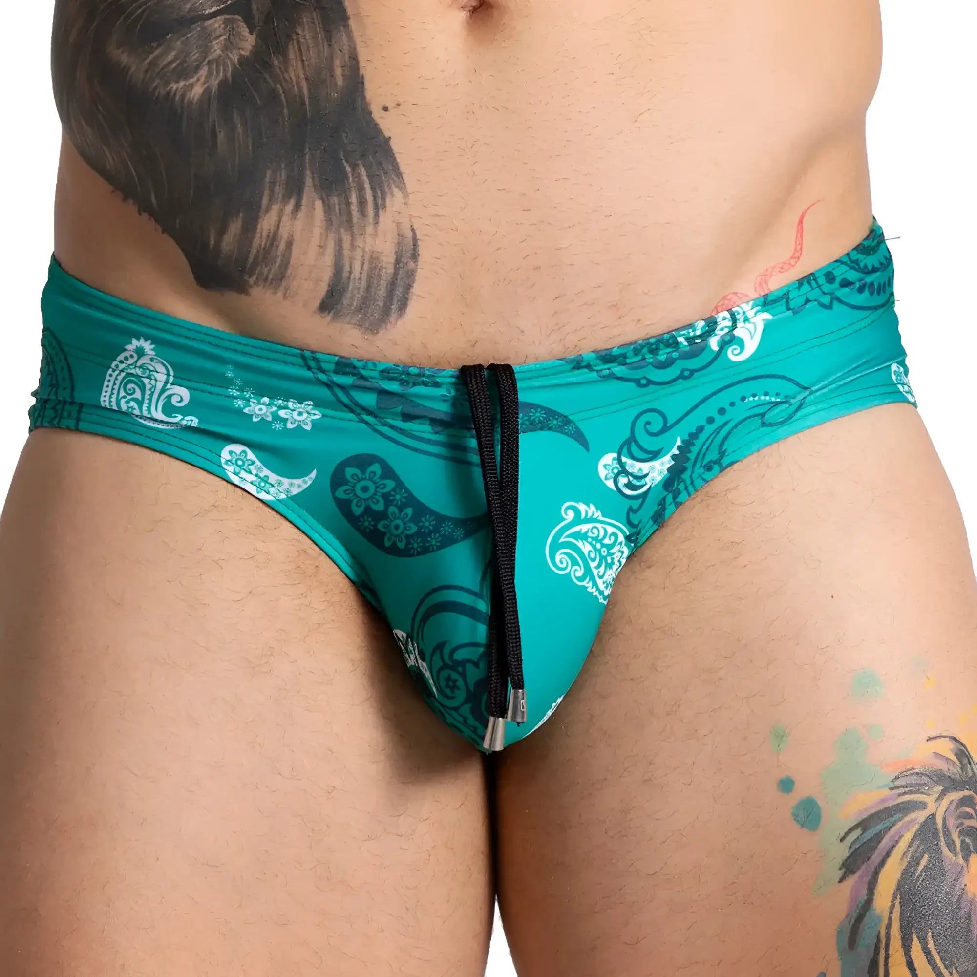 Teal gigo paradise swim brief with white and dark teal paisley patterns and a black drawstring closure
