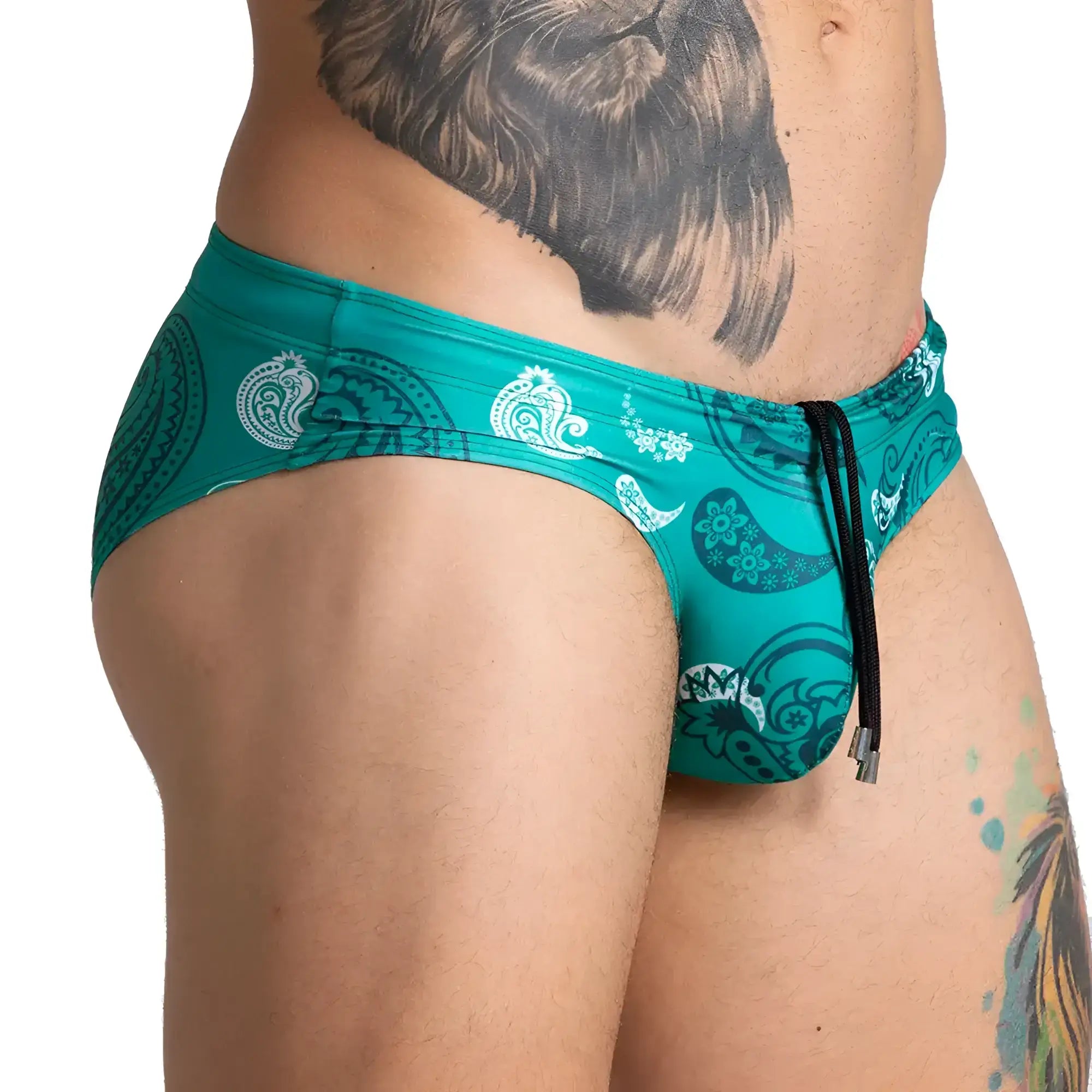 Teal gigo paradise swim brief with white and dark teal paisley pattern and black drawstring for swimming
