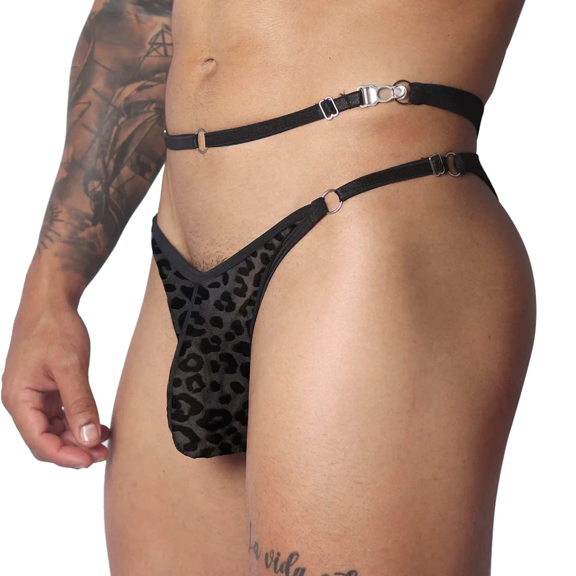 Black leopard-print plush jockstrap featuring thin elastic waist straps, metal rings, and adjustable metal hardware.