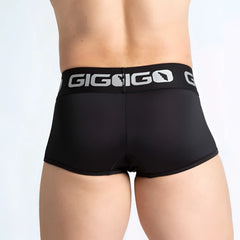 Black gigi go menâ€™s briefs with silver logo band made from breathable material in the gigo purity black trunk style