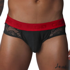 Black jock thong with floral lace side panels and a wide red elastic waistband featuring the Gigo logo.