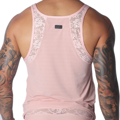 Romantic pink tank top in ribbed mesh with decorative floral lace trim along the shoulder straps and hem.