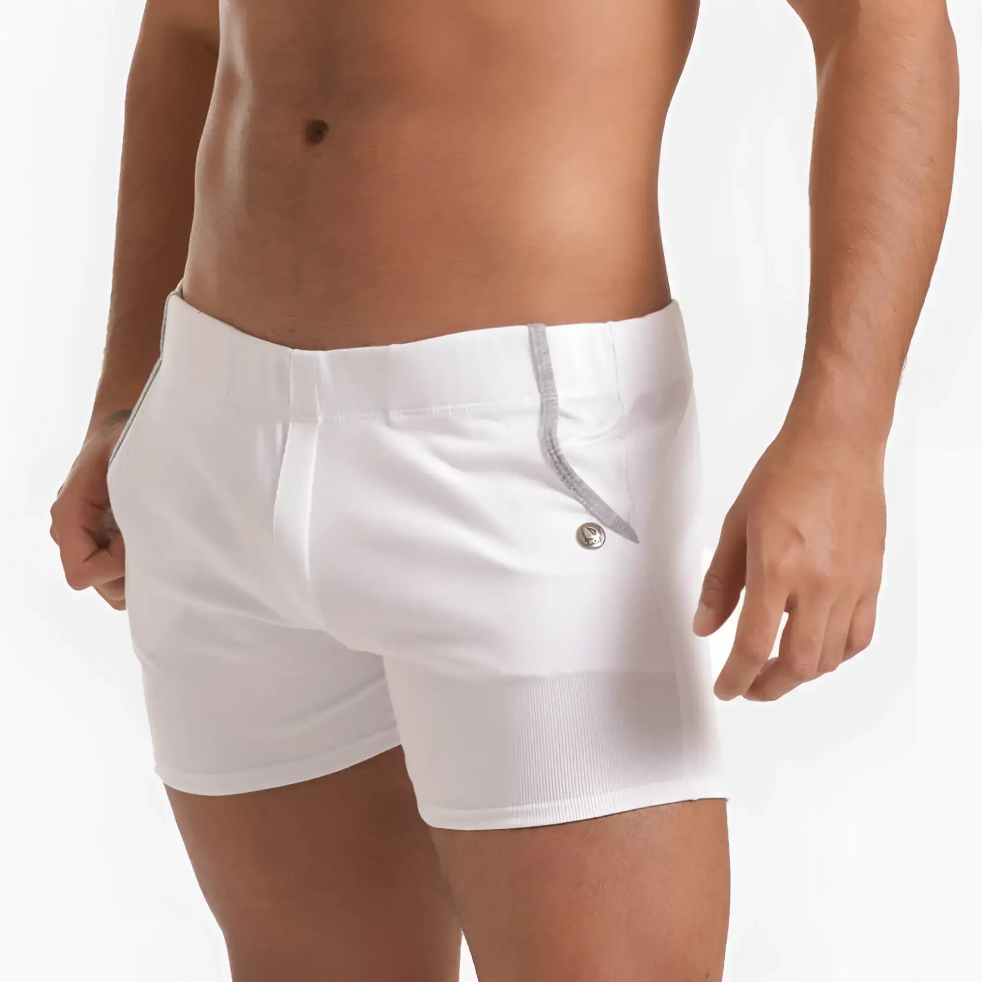 White menâ€™s swim trunks gigo scanaling with subtle ribbed texture and silver zipper detail