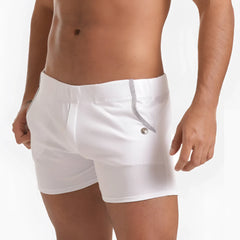 White menâ€™s swim trunks gigo scanaling with subtle ribbed texture and silver zipper detail