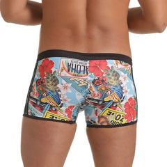 Gigo Seventies swim trunks featuring vibrant red hibiscus flowers vintage hawaiian plates and surfboards on light blue