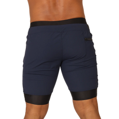 Navy blue gigo sporty short with black elastic waistband and leg cuffs featuring a zippered side pocket