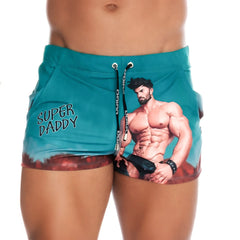Teal Gigo Super Daddy blue beachwear swim trunks with printed muscular man illustration and super daddy text on the side