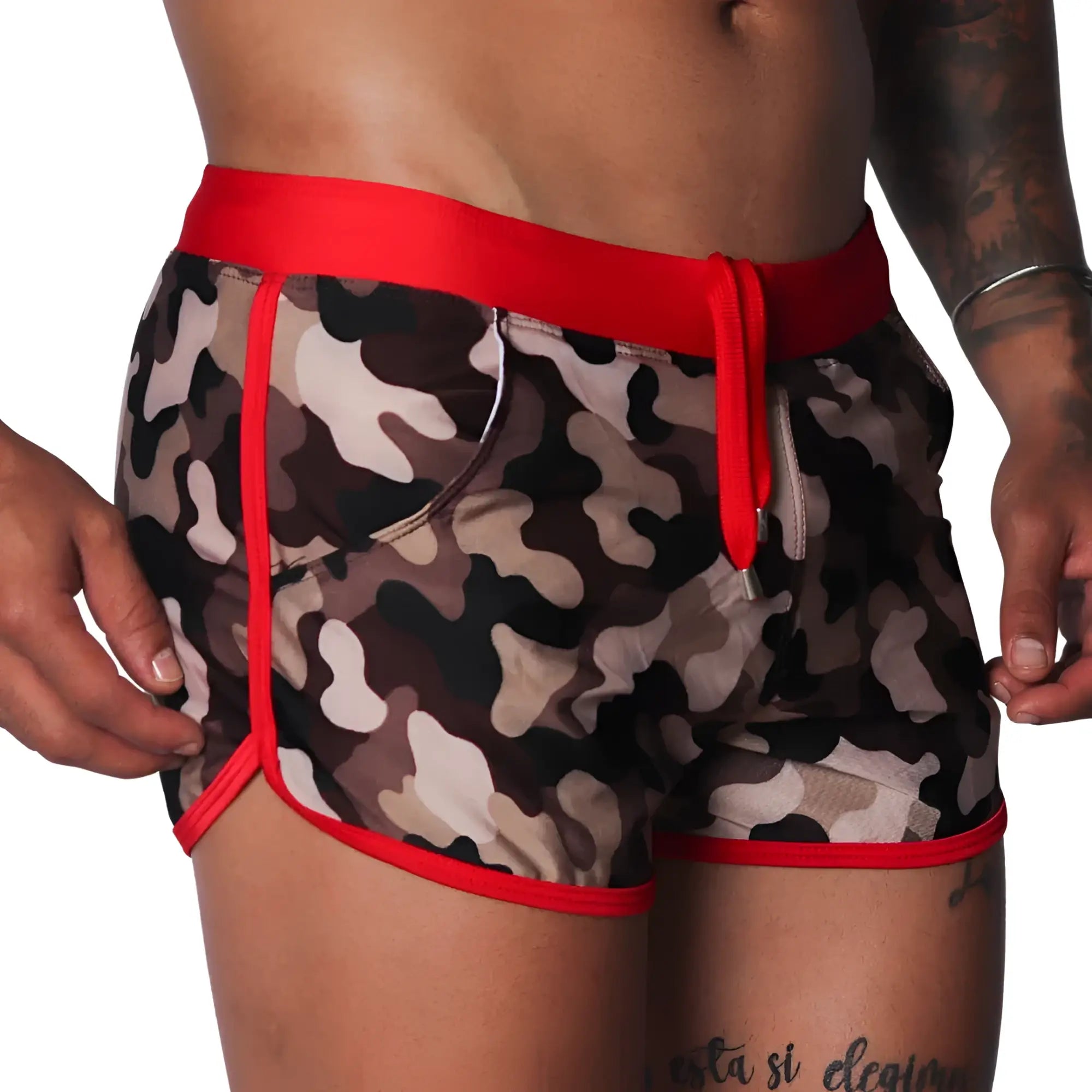 Men's camouflage print swim shorts with red trim, elastic waistband, and matching drawstring.
