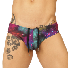 Gigo universe swimbrief vibrant galaxy-print swim trunks with magenta teal and cosmic sparkles design