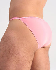 Pink glide micro brief teamster briefs with matching elastic waistband featuring brand logo