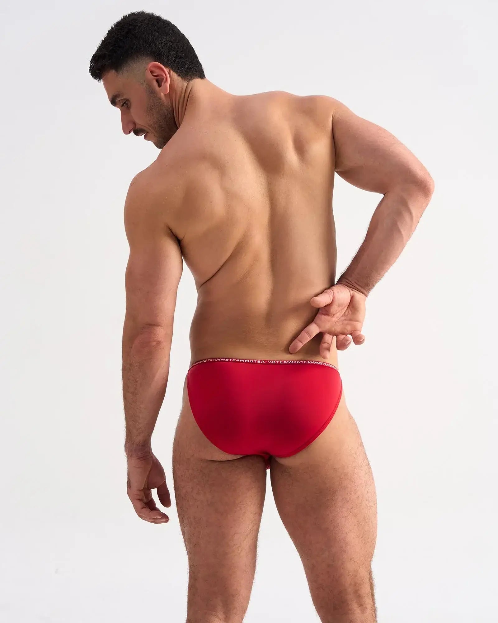 Red glide micro brief underwear with subtle elastic waistband and soft breathable fabric for everyday comfort