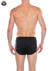 Back view of a man wearing black and gray short athletic shorts with an elastic waistband by AMERICAN JOCK