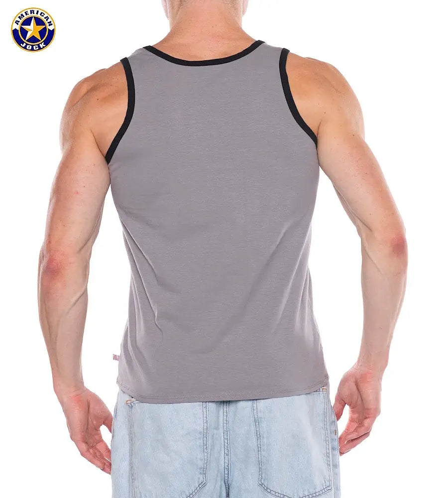 Back view of a man wearing a gray tank top with black trim and light blue denim shorts by AMERICAN JOCK