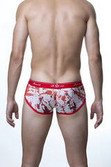Red and white splatter patterned groovin underwear cup boxer briefs with red waistband and arovind logo