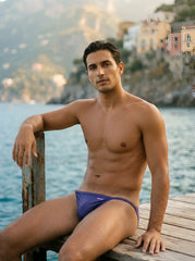 Purple groovin underwear string bikini indigo purple swim trunks with subtle brand logo on waistband