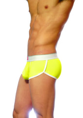 Bright neon yellow groovin underwear ventilated cup boxer with white trim and gray waistband shown from front
