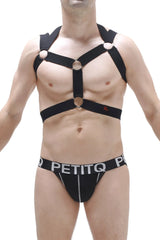 Black harness ancol with adjustable straps and circular metal rings worn over the torso