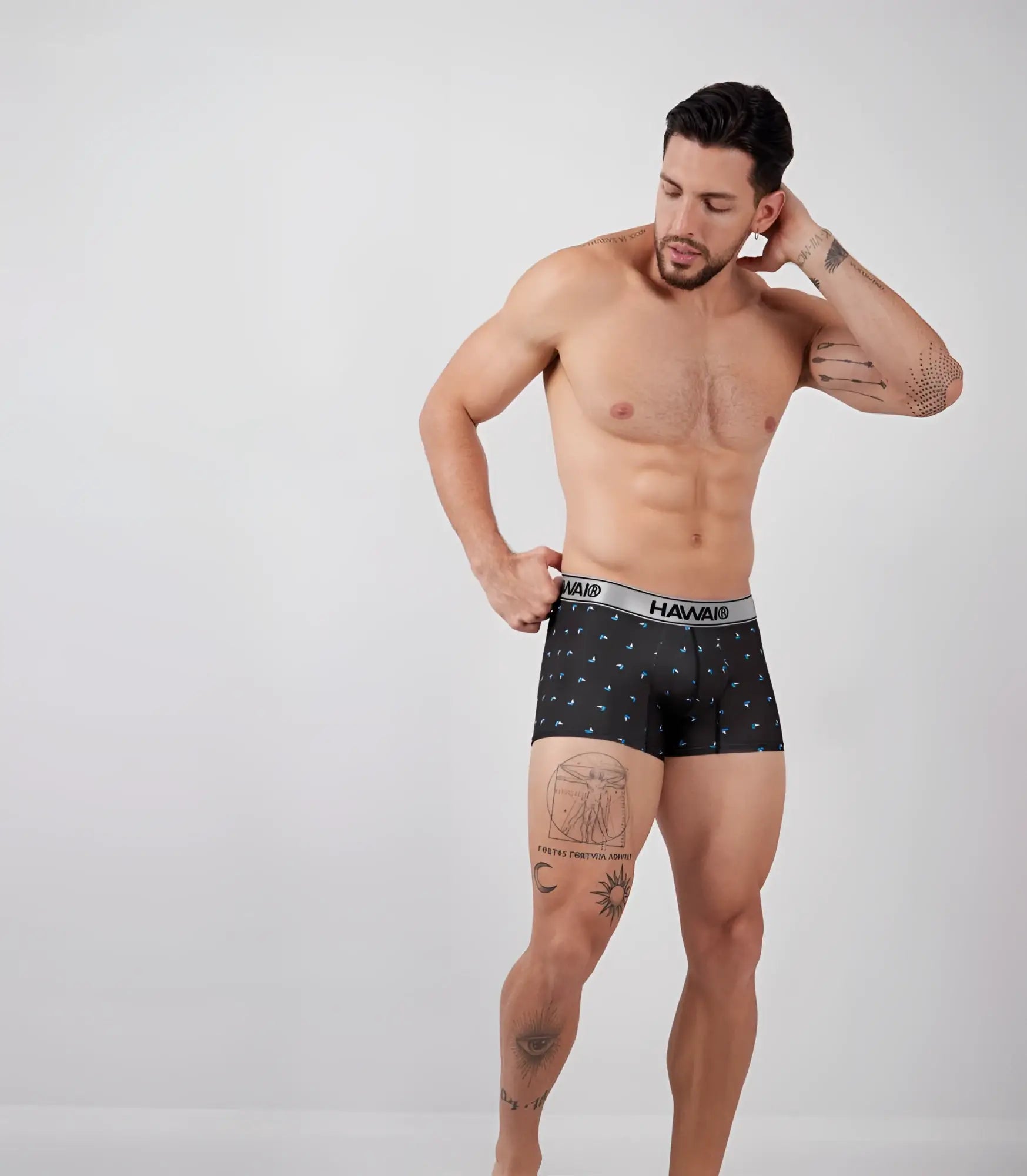 Black hawaii boxer briefs with small blue geometric pattern microfiber trunks featuring gray waistband and brand name