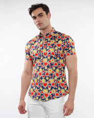 A vibrant hearts print stretch knit short-sleeved shirt with red and yellow hearts on navy blue background