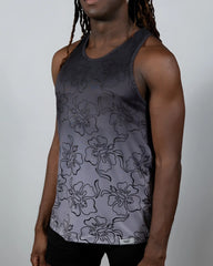 A dark gray hibiscus ombre print tank top with black outlined flowers and subtle fading to lighter gray at the bottom