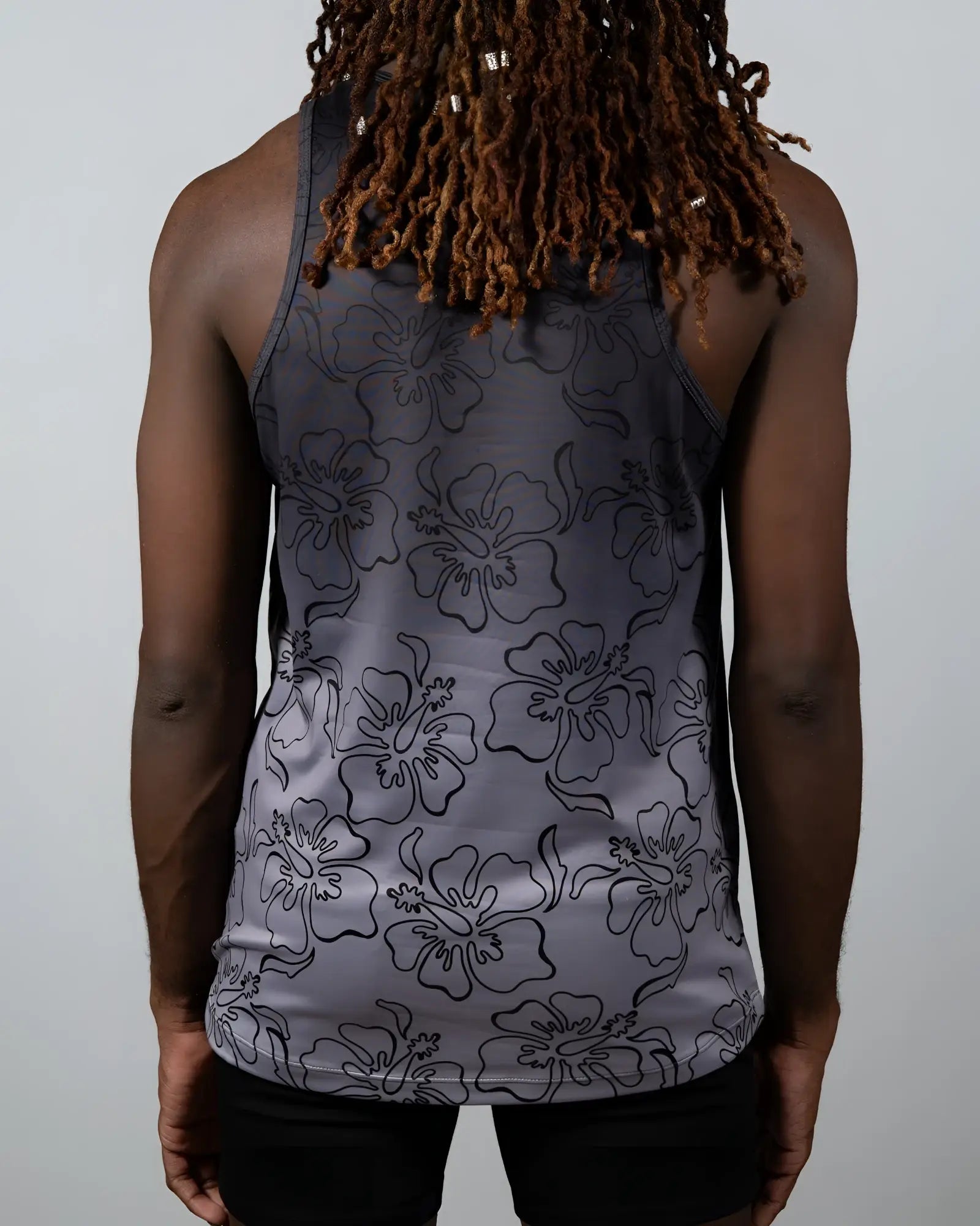 Gray tank top featuring black outlined hibiscus flower pattern designed for casual summer wear