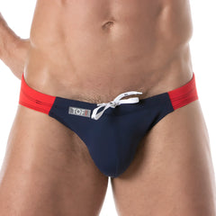 Navy blue and red mens holidays swim bikini trunks with white drawstring tie designed for beach and pool use