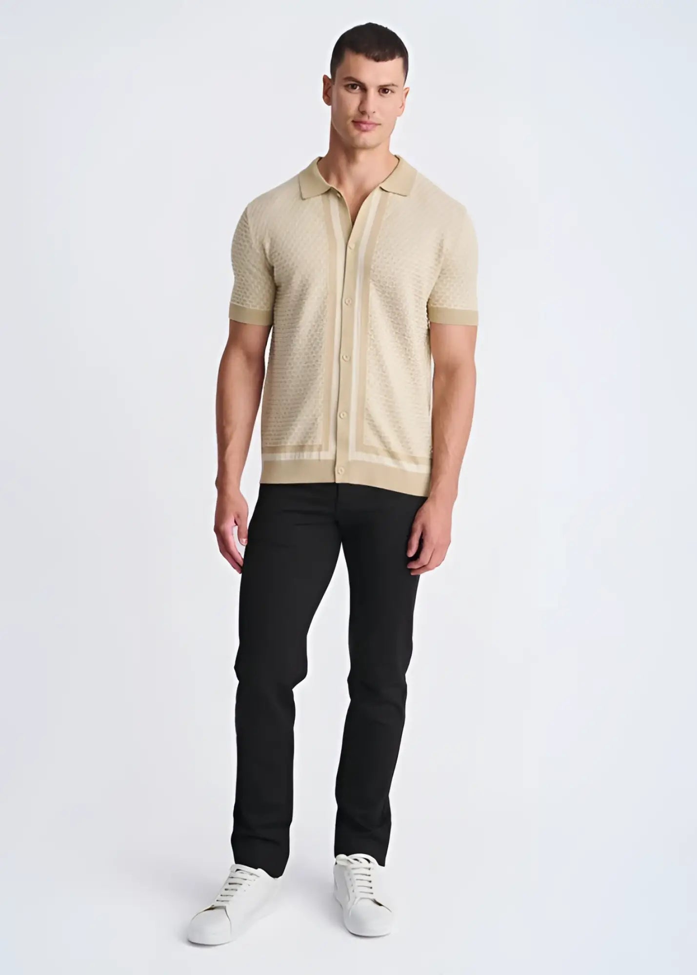 Beige honeycomb textured knit polo shirt with short sleeves and button front detail