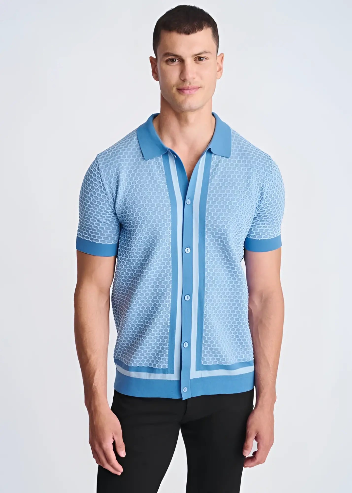 Light blue short-sleeved knit polo shirt with honeycomb texture and darker blue trim on collar placket cuffs and hem