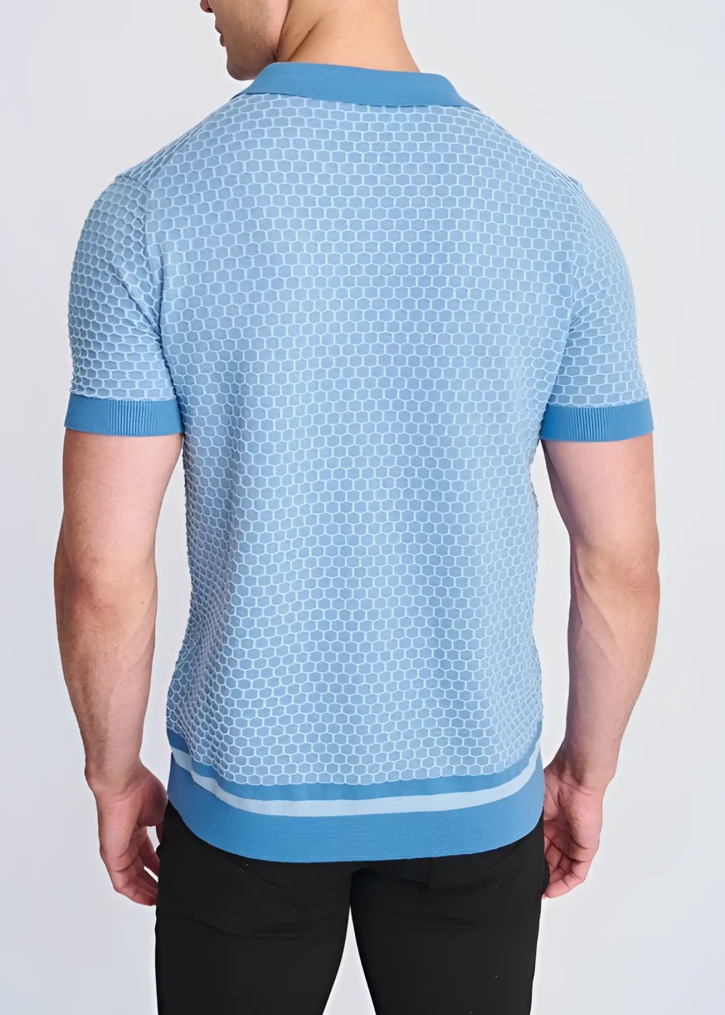 Light blue short-sleeved honeycomb textured knit shirt with subtle hexagonal pattern and matching ribbed trims